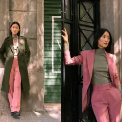 Due donne con outfit eleganti. Una indossa un cappotto verde oliva e pantaloni rosa, l'altra un tailleur rosa e un dolcevita verde oliva. I verde oliva abbinamenti sono chic.
