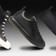 Tre paia di sneakers nere uomo, eleganti e versatili, perfette per ogni outfit.