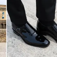 Uomo elegante in abito nero con camicia e papillon, indossa lucidi mocassini con fibbia.