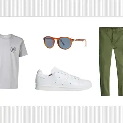 Outfit con t-shirt grigia, occhiali da sole tartarugati, pantaloni verdi e le iconiche Adidas Stan Smith, un classico intramontabile.