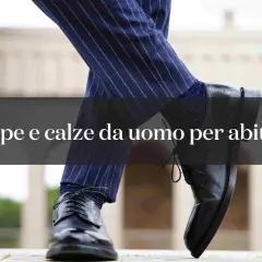Scarpe nere lucide e calze blu a pois con un abito gessato: ecco come abbinare scarpe blu per un look impeccabile.