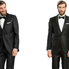 Uomo con tuxedo a sinistra, con bicchiere di champagne, e uomo con smoking a destra.