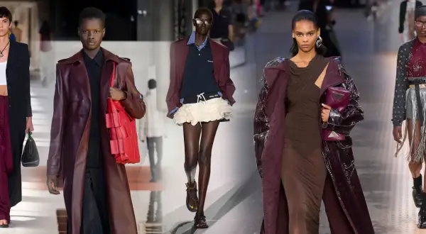 Sfilata di moda con modelli che indossano abiti eleganti. Un perfetto abbinamento bordeaux con trench in pelle e pantaloni ampi.