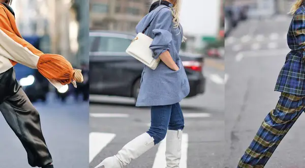 Tre donne sfoggiano eleganti outfit autunnali: un look con maniche arancioni e pantaloni satinati, uno con blazer azzurro e stivali bianchi, e uno con completo a quadri e décolleté verdi.