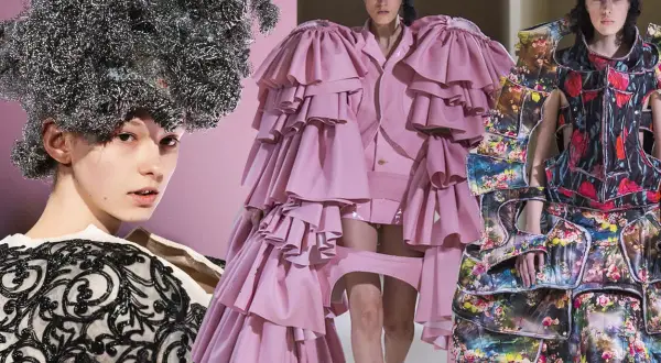 Modelli con acconciature audaci e abiti voluminosi, un'espressione della visione di Rei Kawakubo.