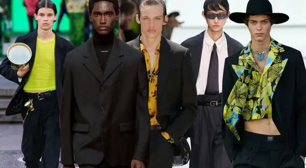 Modelli con abito nero uomo, camicia colorata e cravatta. Stili diversi per un look audace.
