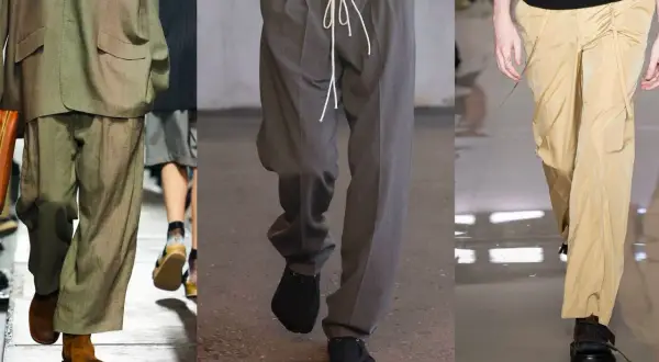 Tre modelli di pantaloni uomo: uno in lino beige con giacca abbinata, uno grigio con coulisse e uno color sabbia drappeggiato.
