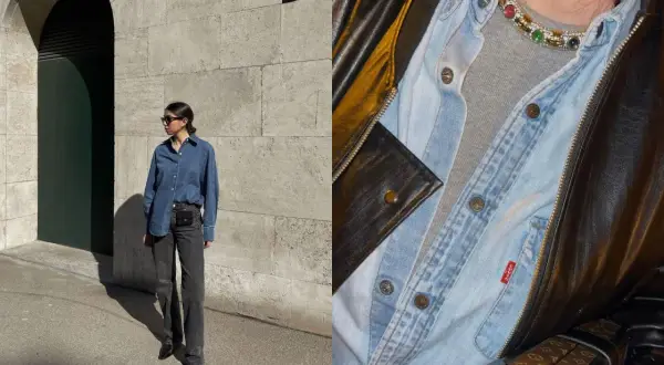 Look di tendenza: camicia jeans aperta su t-shirt grigia, jeans scuri e borsa a tracolla. Dettagli di stile con collana colorata e giacca in pelle.
