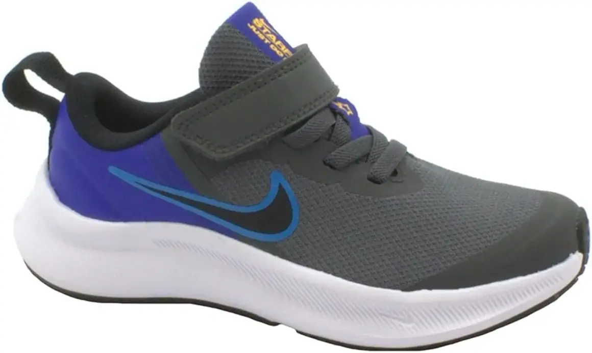 Scarpa Nike grigia con dettagli blu e viola, chiusura a velcro. Perfetta per ogni avventura, che tu sia grande o piccolo.