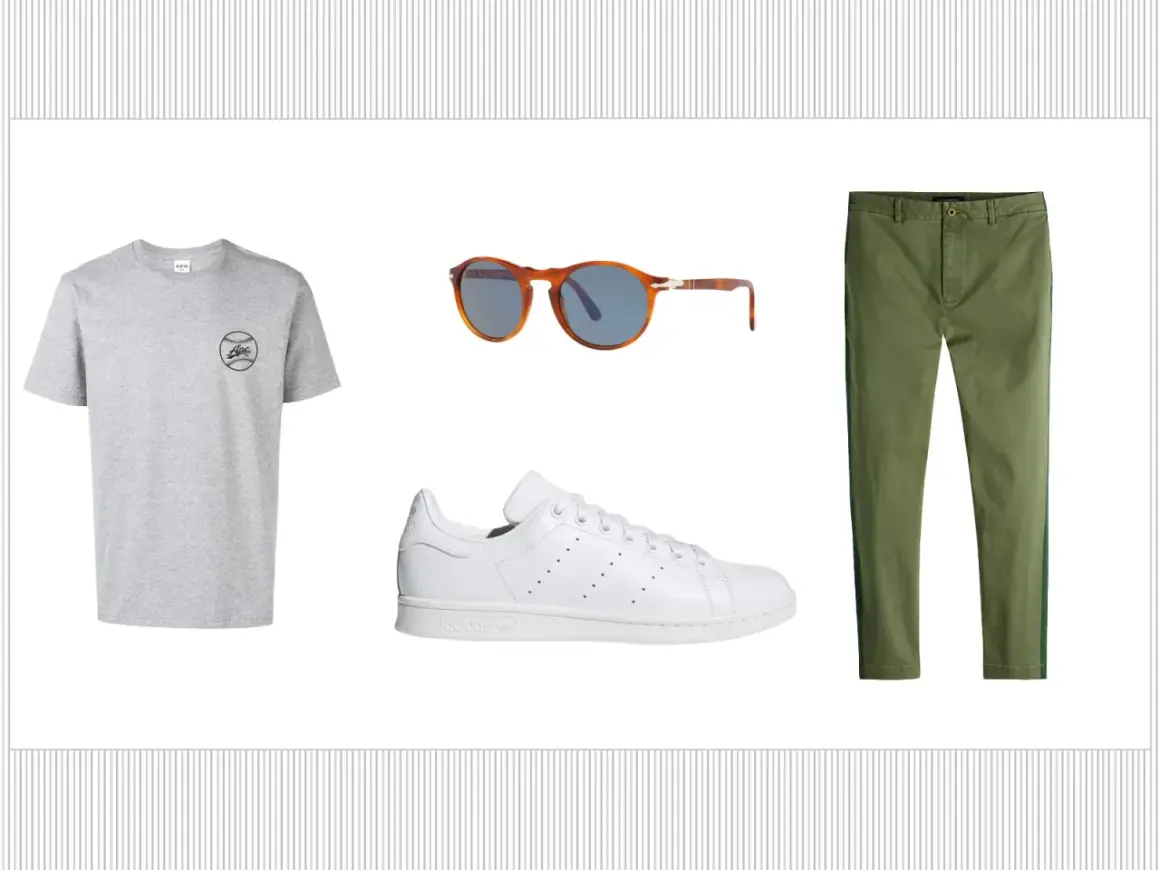 Outfit con t-shirt grigia, occhiali da sole tartarugati, pantaloni verdi e le iconiche Adidas Stan Smith, un classico intramontabile.