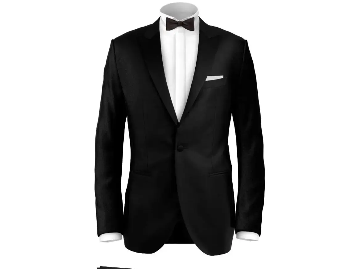 Completo da uomo per black tie dress code: giacca nera, camicia bianca, papillon e pochette. Eleganza senza tempo.