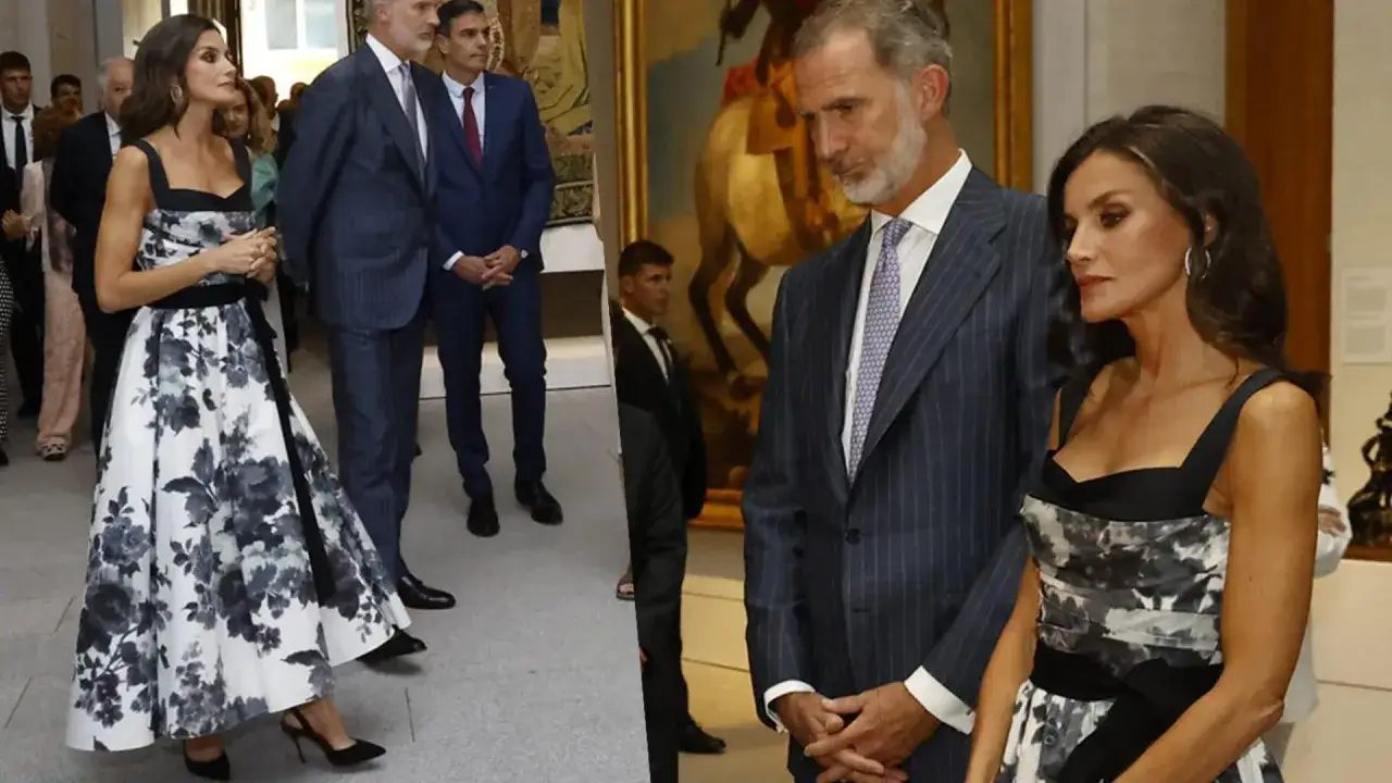 Letizia Ortiz con un abito floreale bianco e nero, elegante e raffinata, partecipa a un evento ufficiale.