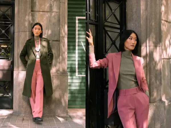 Due donne con outfit eleganti. Una indossa un cappotto verde oliva e pantaloni rosa, l'altra un tailleur rosa e un dolcevita verde oliva. I verde oliva abbinamenti sono chic.
