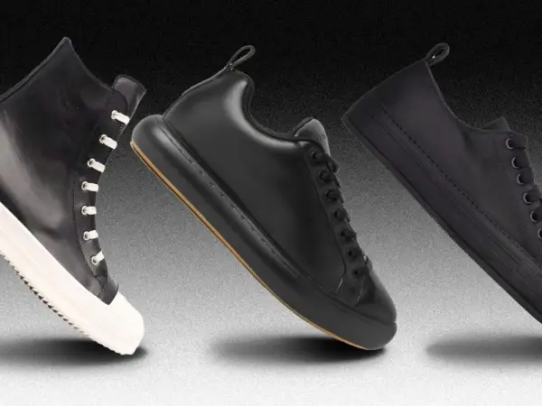 Tre paia di sneakers nere uomo, eleganti e versatili, perfette per ogni outfit.