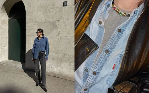 Look di tendenza: camicia jeans aperta su t-shirt grigia, jeans scuri e borsa a tracolla. Dettagli di stile con collana colorata e giacca in pelle.